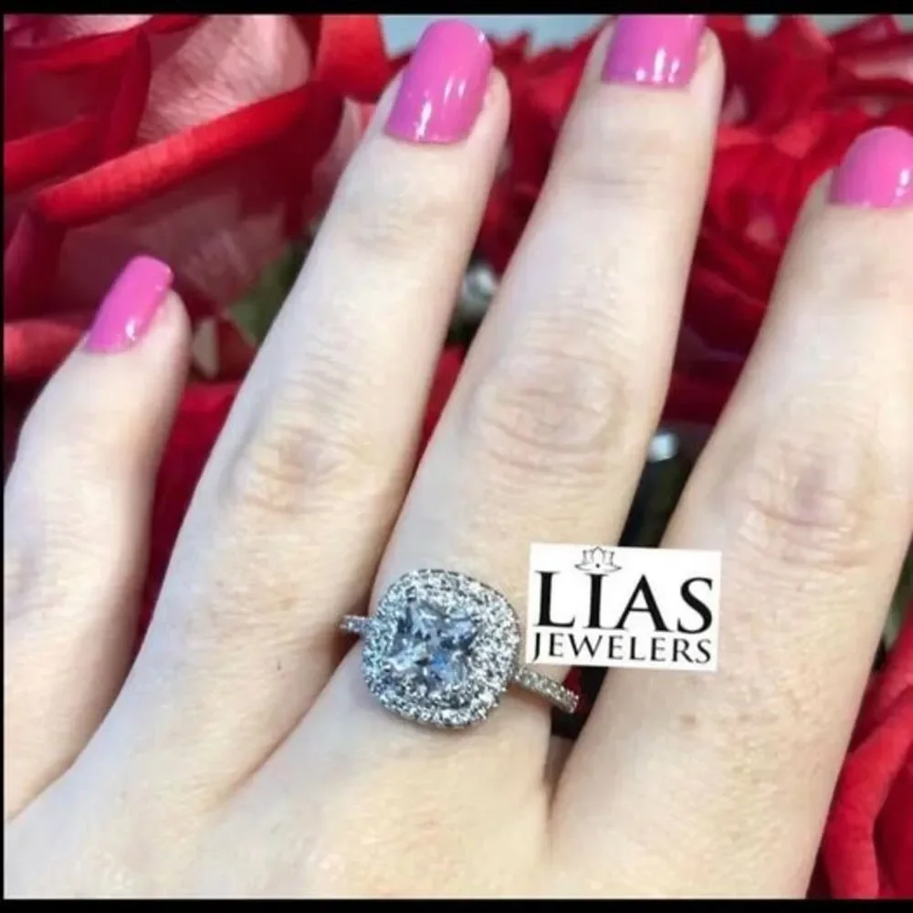 New 18k white gold engagement ring